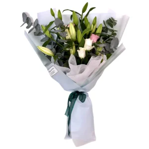 white roses and lilies bouquet