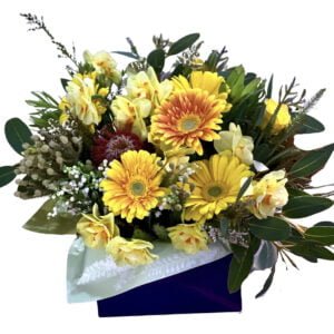 yellow flowers in a box