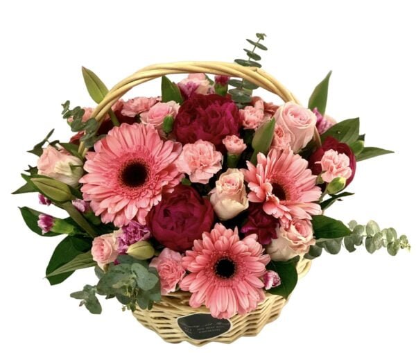 pink gerbera and red rose flower basket
