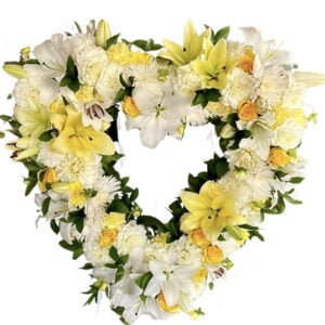 heart shape yellow and white lilies funeral wreath