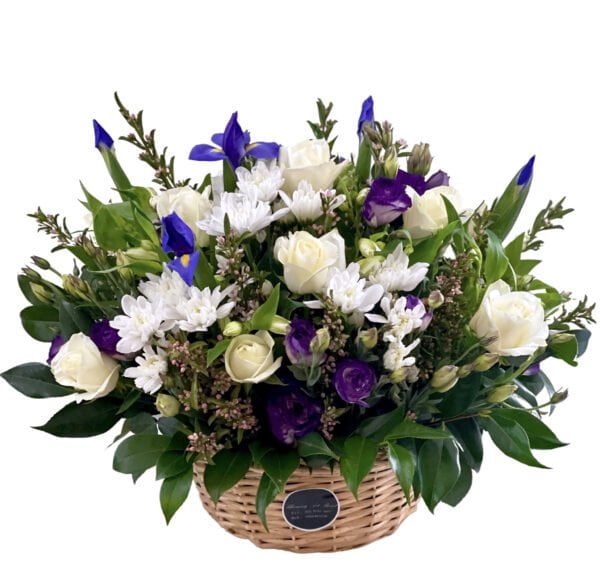 white roses and iris flower basket