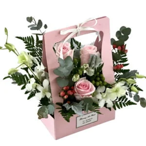 pink and white flower basket