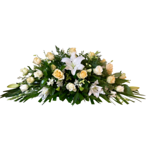 white roses lilies casket flowers