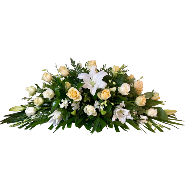 white roses lilies casket flowers