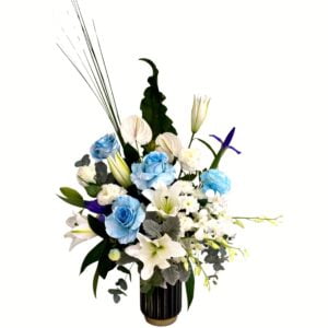Blue and White Flowers in a Black Tall Vase
