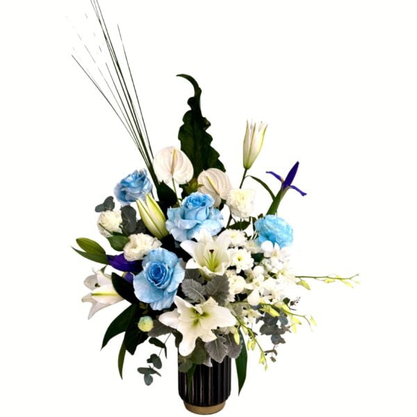 Blue and White Flowers in a Black Tall Vase